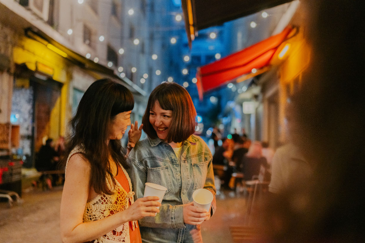 Group of women enjoying evening dining experience on Vivida bespoke European tour - small group travel atmosphere